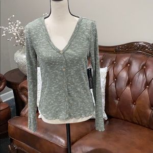 Cozy knit top
Almost famous size large